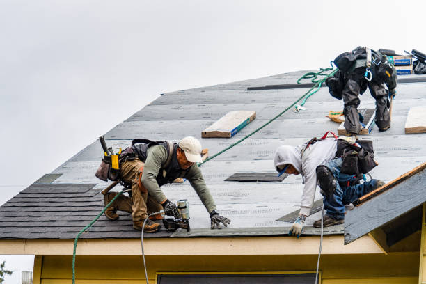 Professional Gutter Installation technician working in Berlin, MA